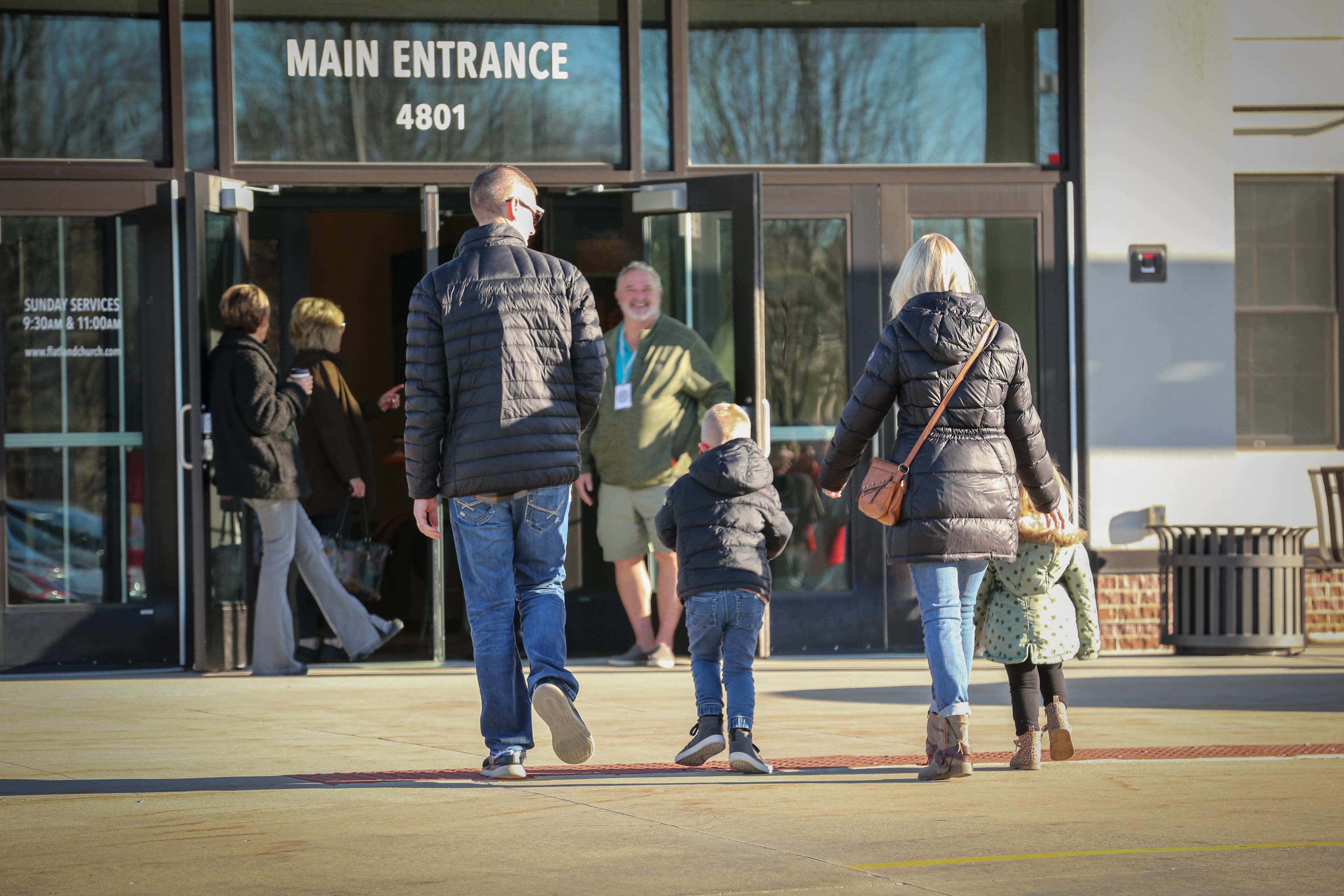 Family entering Flatland 144.